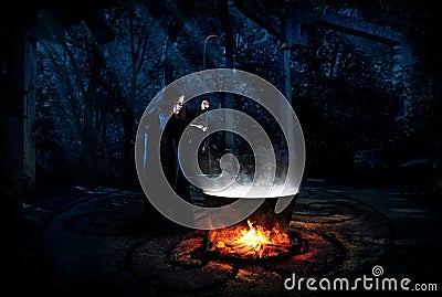 Witch in night forest version Stock Photo