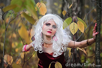 Witch in the woods on Halloween Stock Photo