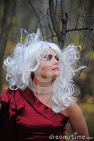 Witch in the woods on Halloween Stock Photo