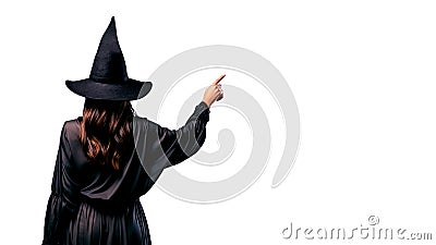 Witching Hour at Halloween, witch pointing at white copy space. Generative AI Stock Photo