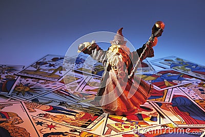 Wizard Figurine and Tarot Cards Stock Photo