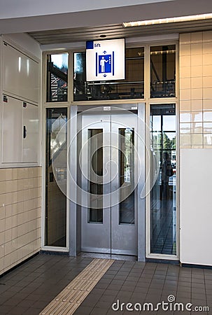 Doors to lift elevator with sign above Editorial Stock Photo