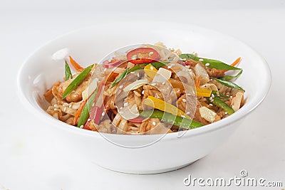 Wok noodles with beef vegetables, ginger, sweet pepper on a plate Stock Photo