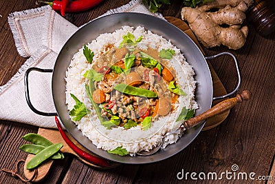 Wok pan with meat strips and vegetables Stock Photo
