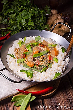Wok pan with meat strips and vegetables Stock Photo