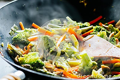 Wok stir fry with vegetables Stock Photo