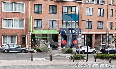 Woluwe-Saint-Pierre, Belgium - Facades of local shops and residential houses at the Stockle square Editorial Stock Photo