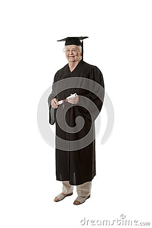 Beauitiful Caucasian woman in a black graduation gown with diploma Stock Photo