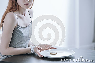 Woman addicted to weight loss Stock Photo