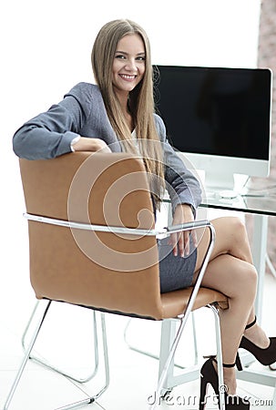 Woman administrator sitting at the workplace Stock Photo