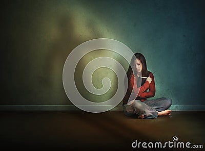 Woman afraid and alone Stock Photo