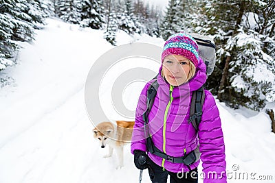 Woman with Akita Inu dog, Karkonosze Mountains, Poland Stock Photo
