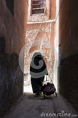 Woman in alley Median Marrkech Stock Photo