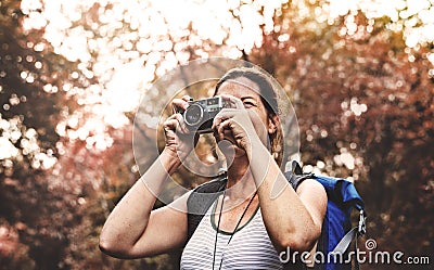 Woman with an analog camera Stock Photo