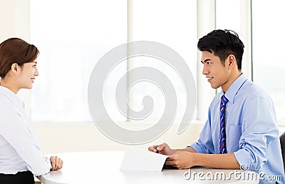 Woman answering questions of recruiter during job interview Stock Photo