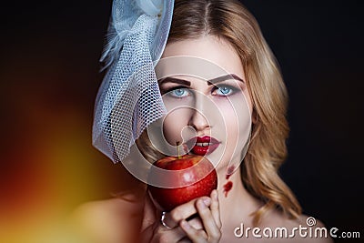 Woman with apple Stock Photo