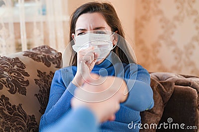 Woman applying antiseptic gel at home, closeup. Infection preventenion concept. Pandemic Coronavirus Stock Photo