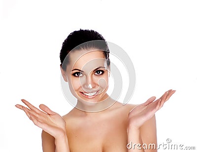 Woman applying creme on face Stock Photo