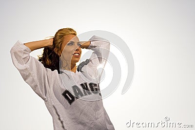Woman with arms behind head Stock Photo