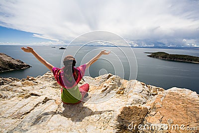 Woman with arms raised Stock Photo