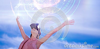 Composite image of woman with arms raised looking through virtual reality simulator against white ba Stock Photo