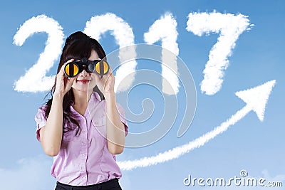 Woman with 2017 and arrow background Stock Photo