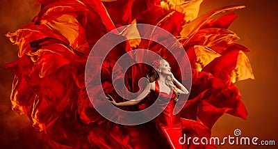 Woman Art Fantasy, Dancing Fashion Model on Red Fabric Color Explosion Stock Photo