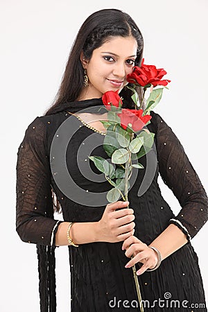 Woman with artificial roses Stock Photo