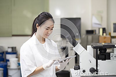 woman asian engineer or chemistry doing chemical test in laboratory, science and research concept Stock Photo