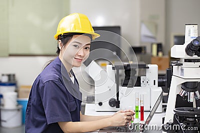 Woman asian engineer doing chemical test in laboratory Stock Photo