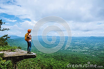 Woman asians travel relax in the holiday. is on the cliff Stock Photo