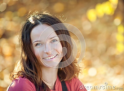 Woman in autumn park Stock Photo