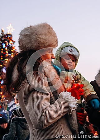 Woman and baby celebration Orthodox Christmas Editorial Stock Photo