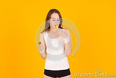 Young cute girl with whistle, studio Stock Photo