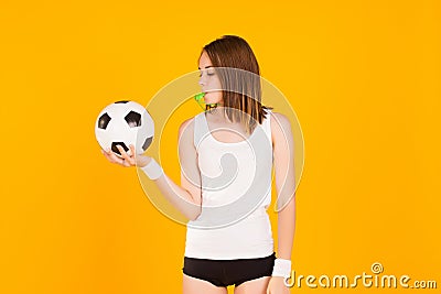 Young cute girl with whistle, studio Stock Photo