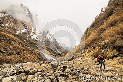 Woman backpacker traveling hiking in mountains Travel Lifestyle success concept adventure active summer vacations outdoor mountain Stock Photo