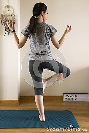 Woman in balance doing yoga Stock Photo