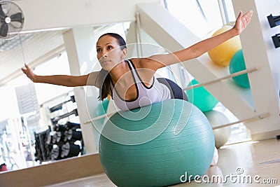 Woman Balancing On Swiss Ball Stock Photo