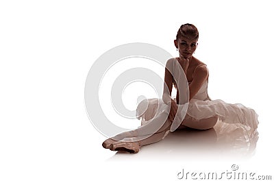 Woman ballerina in white pack tutu posing on white background Stock Photo