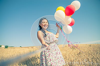 Woman with balloons Stock Photo