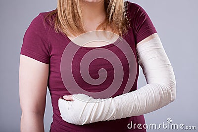 Woman with bandaged arm Stock Photo