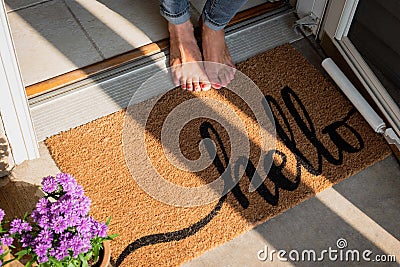 Welcome mat in front of new home Stock Photo