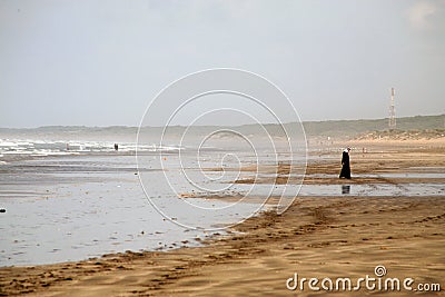 Woman on the beach Stock Photo