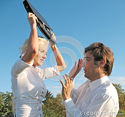 Woman beats the man Stock Photo