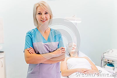 Woman beautician doctor at work in spa center Stock Photo