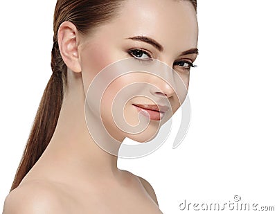 Woman with beautiful face, healthy skin and her hair on a back close up portrait studio on white Stock Photo