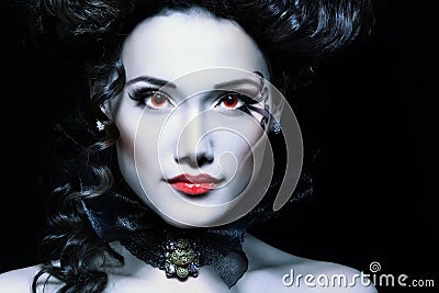 Woman beautiful halloween vampire baroque aristocrat Stock Photo