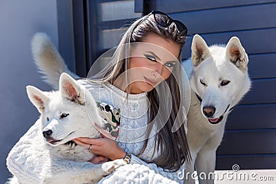 Woman with a beautiful husky dog Stock Photo