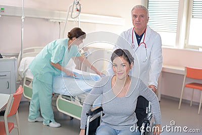 Woman being discharge from hospital Stock Photo