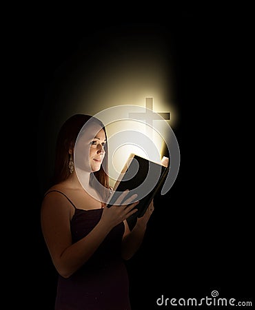 Woman with bible Stock Photo